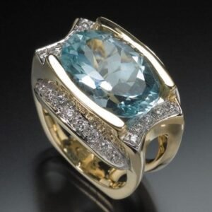 027abe0d-c9c8-4cd3-a1a1-4d377df4d208.jpg Light Blue Oval Zircon With Diamond Ring